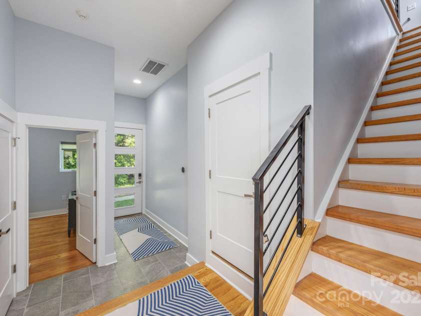 327 Turner Avenue, Charlotte, NC 28208.  MLS# CAR4270286, YatesRealty ID 20967. Lower level exterior entrance and garage entrance