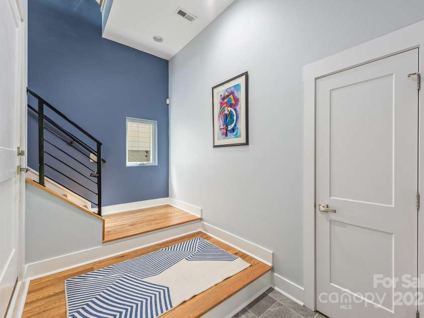 327 Turner Avenue, Charlotte, NC 28208.  MLS# CAR4270286, YatesRealty ID 20967. Lower level exterior entrance with storage closet and garage entrance