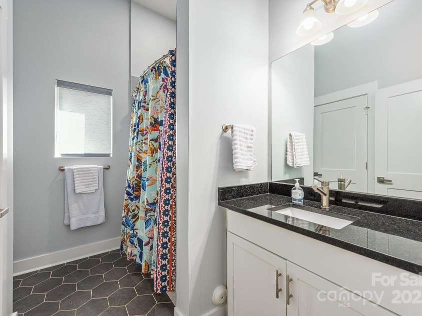 327 Turner Avenue, Charlotte, NC 28208.  MLS# CAR4270286, YatesRealty ID 20967. Lower level full bathroom