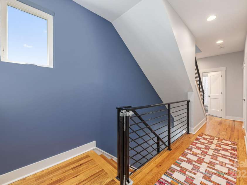 327 Turner Avenue, Charlotte, NC 28208.  MLS# CAR4270286, YatesRealty ID 20967. Stairs to the rooftop terrace