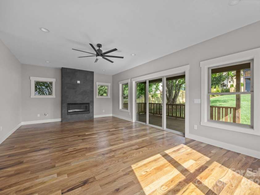 32 Woodrow Avenue, Asheville, NC 28801.  MLS# CAR4267388, YatesRealty ID 20969. Living area is drenched in light