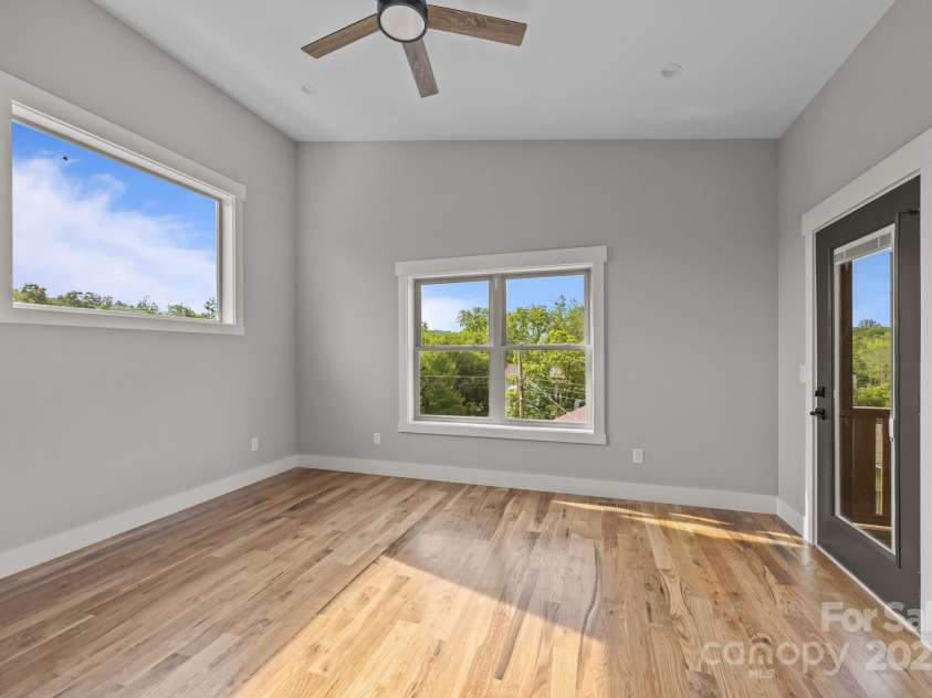 32 Woodrow Avenue, Asheville, NC 28801.  MLS# CAR4267388, YatesRealty ID 20969. Primary has lots of light and vaulted ceiling