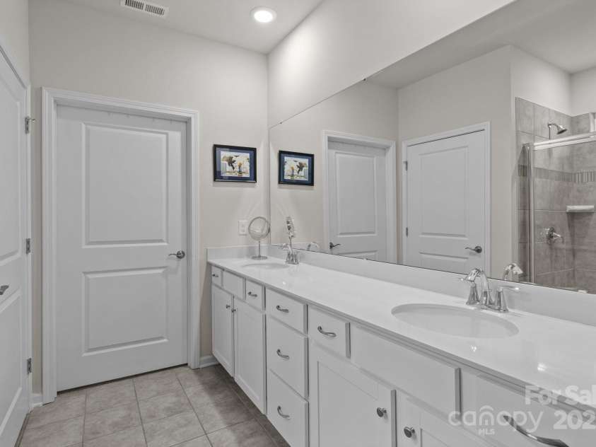 4720 Maiden Creek Way, Maiden, NC 28650.  MLS# CAR4232714, YatesRealty ID 2097. Primary bath with double vanity