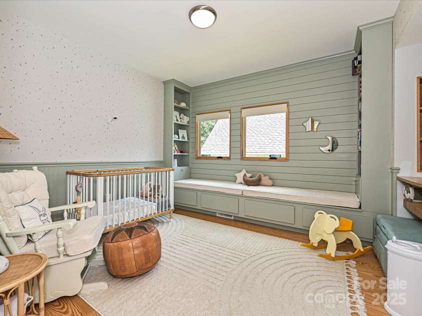 2553 Elkwood Circle, Charlotte, NC 28205.  MLS# CAR4272669, YatesRealty ID 20971. Secondary bedroom w/ custom bench (storage)
