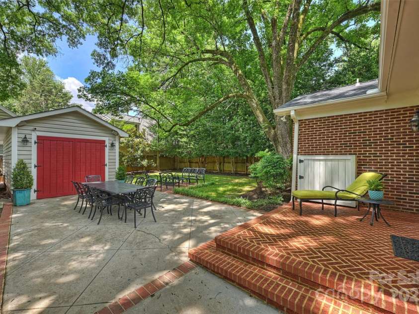 726 Kingston Avenue, Charlotte, NC 28203.  MLS# CAR4272217, YatesRealty ID 20972. Backyard patio great for entertaining