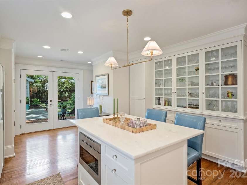 726 Kingston Avenue, Charlotte, NC 28203.  MLS# CAR4272217, YatesRealty ID 20972. Kitchen with French doors leading to outdoor patio