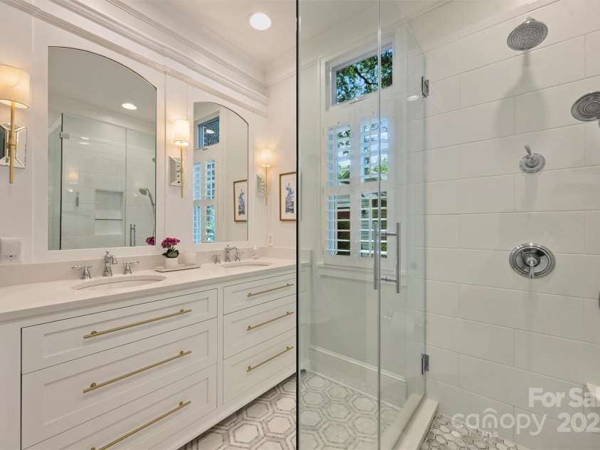 726 Kingston Avenue, Charlotte, NC 28203.  MLS# CAR4272217, YatesRealty ID 20972. New primary bathroom with marble