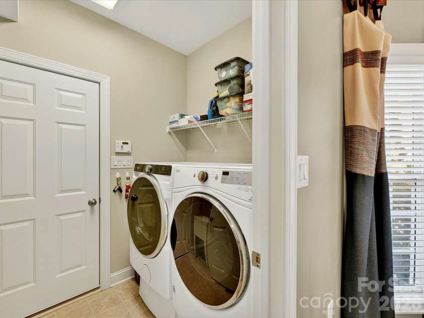 3515 Savannah Way, Monroe, NC 28110.  MLS# CAR4313596, YatesRealty ID 20977. Mud Room on Main Level w/Utility Sink and Cabinet