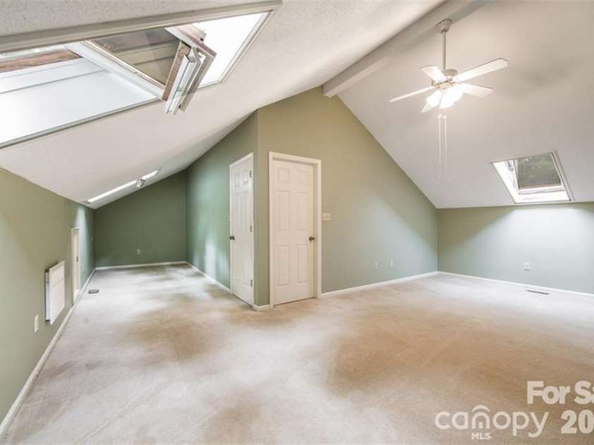 44 Sagebrush Circle, Etowah, NC 28729.  MLS# CAR4370177, YatesRealty ID 20979. Large L-shaped Upstairs Bonus Room