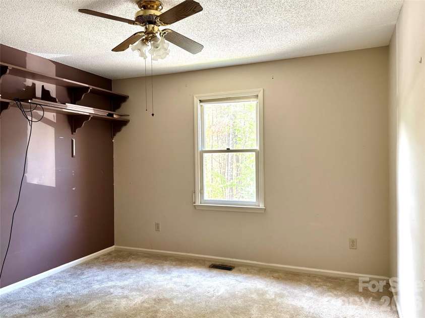 44 Sagebrush Circle, Etowah, NC 28729.  MLS# CAR4370177, YatesRealty ID 20979. Main Level Front Bedroom