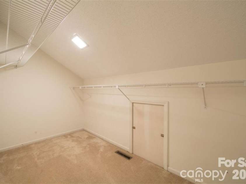 44 Sagebrush Circle, Etowah, NC 28729.  MLS# CAR4370177, YatesRealty ID 20979. Upstairs Walk-In Closet