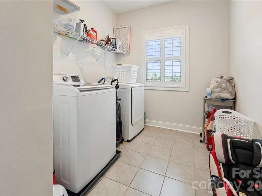39 Hanging Leaf Court, Blythewood, SC 29016.  MLS# CAR4378952, YatesRealty ID 20992. Upstairs Laundry