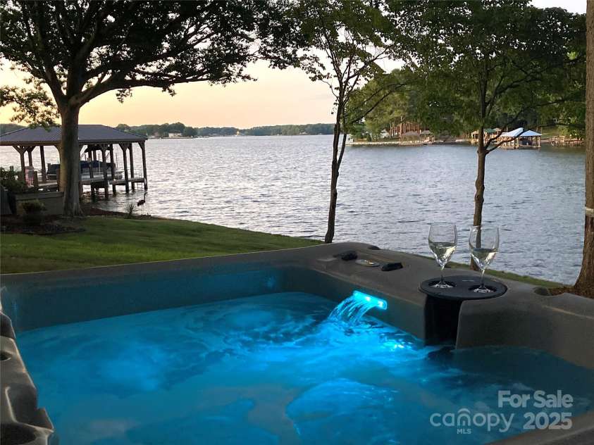 114 Caraway Lane, Mooresville, NC 28117.  MLS# CAR4268740, YatesRealty ID 20994. Hot tub at dusk.