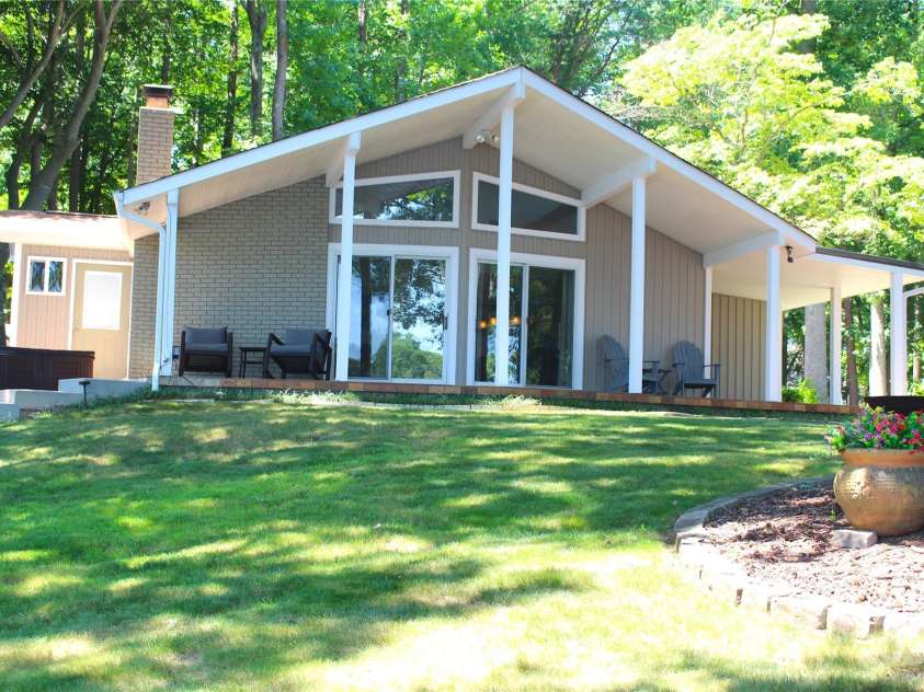 114 Caraway Lane, Mooresville, NC 28117.  MLS# CAR4268740, YatesRealty ID 20994. View toward side patio and living room glass doors.