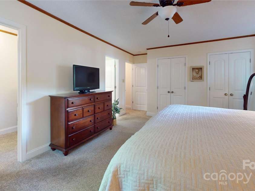 114 Caraway Lane, Mooresville, NC 28117.  MLS# CAR4268740, YatesRealty ID 20994. Walk-in closet to left in this photo. Water views out primary bedroom window.