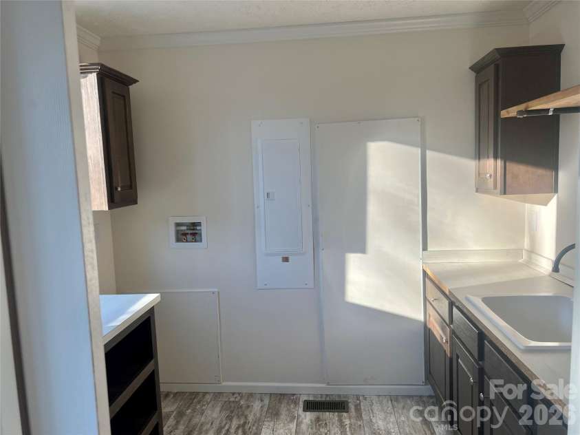 5748 Dalmatian Street, Iron Station, NC 28080.  MLS# CAR3927310, YatesRealty ID 2100. Laundry Room