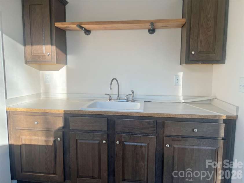 5748 Dalmatian Street, Iron Station, NC 28080.  MLS# CAR3927310, YatesRealty ID 2100. Laundry Room
