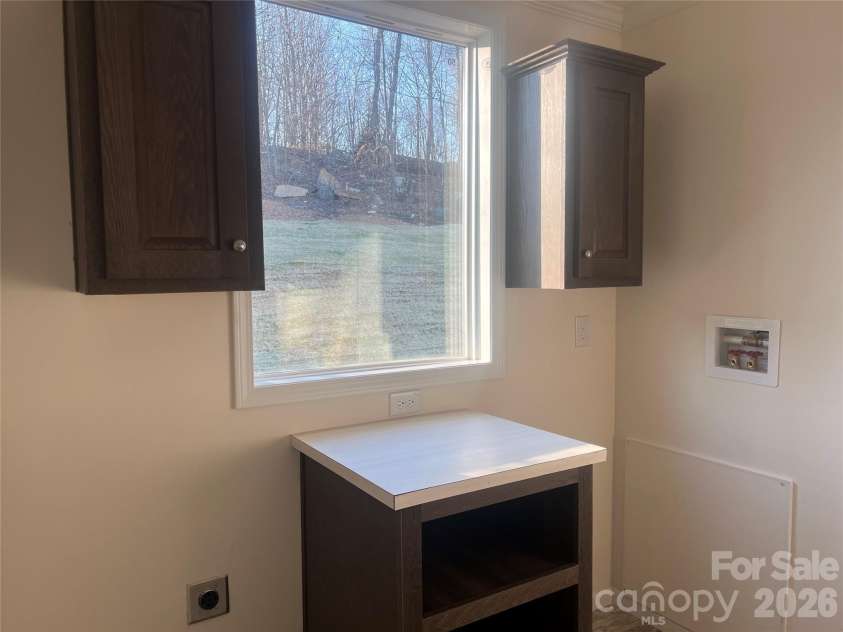 5748 Dalmatian Street, Iron Station, NC 28080.  MLS# CAR3927310, YatesRealty ID 2100. Laundry Room