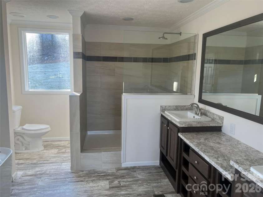 5748 Dalmatian Street, Iron Station, NC 28080.  MLS# CAR3927310, YatesRealty ID 2100. Master Bath