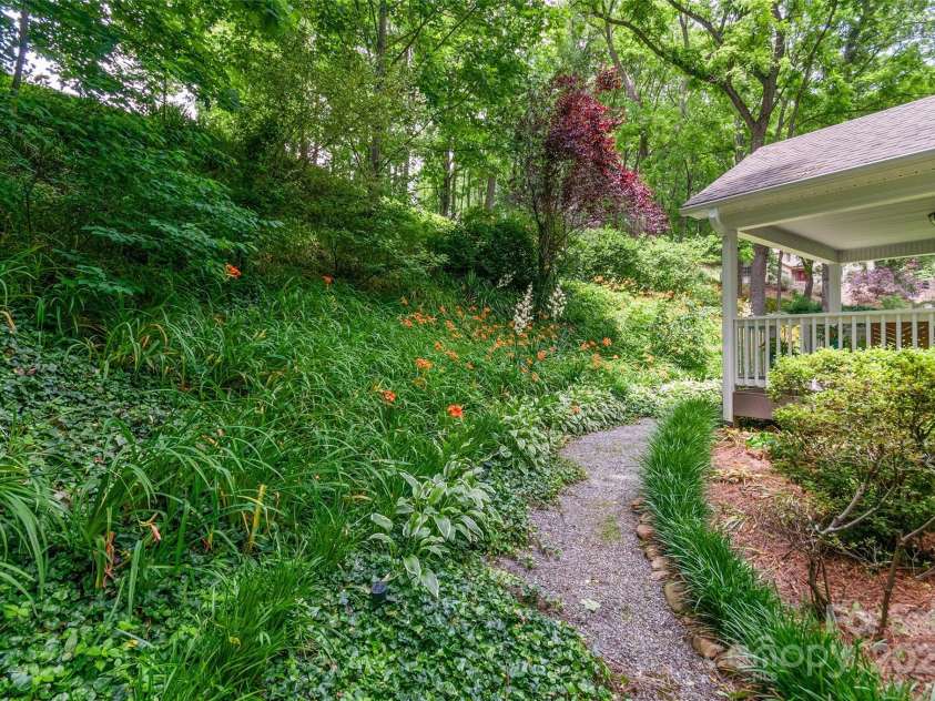 209 Blink Bonny Drive, Waynesville, NC 28786.  MLS# CAR4260662, YatesRealty ID 21001. Beautiful Landscaping