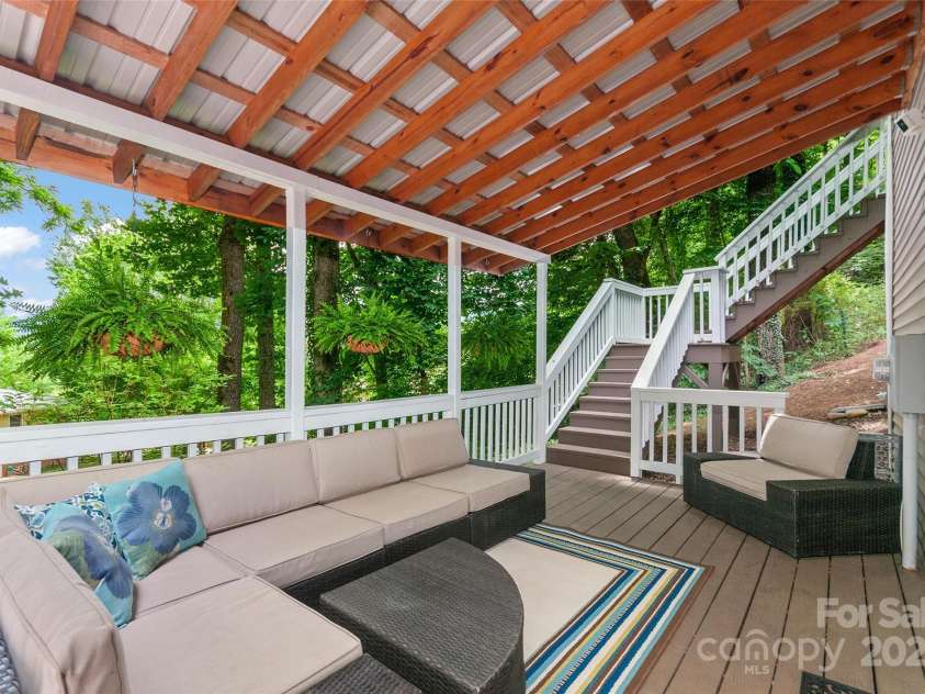 209 Blink Bonny Drive, Waynesville, NC 28786.  MLS# CAR4260662, YatesRealty ID 21001. Covered Porch Downstairs (Outside Downstairs Ensuite)