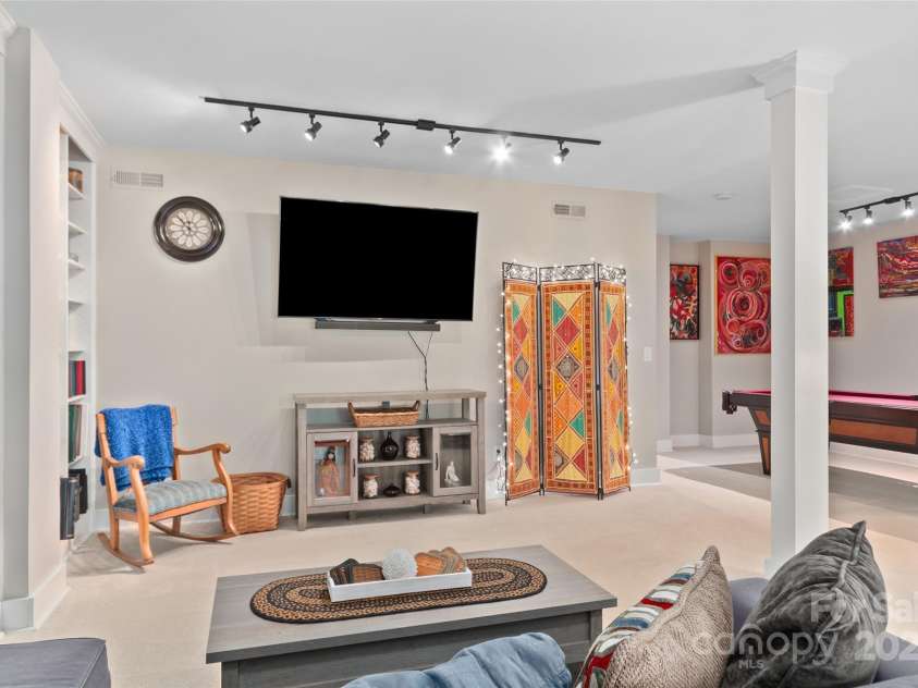 209 Blink Bonny Drive, Waynesville, NC 28786.  MLS# CAR4260662, YatesRealty ID 21001. Downstairs Great Room