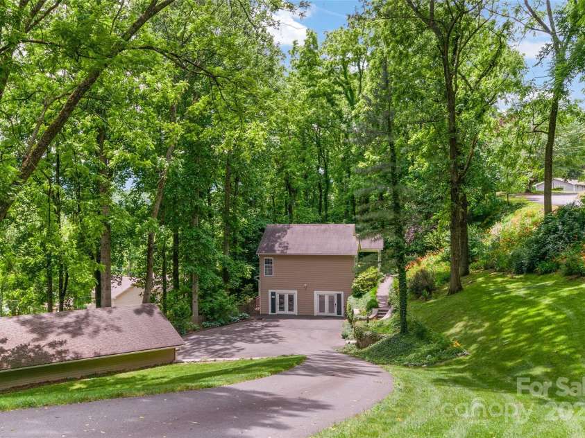 209 Blink Bonny Drive, Waynesville, NC 28786.  MLS# CAR4260662, YatesRealty ID 21001. From the driveway