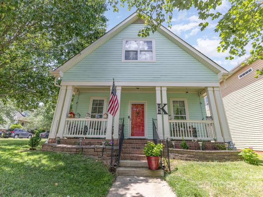 186 Gresham Lane, Mooresville, NC 28117.  MLS# CAR4260400, YatesRealty ID 21002. Enjoy sitting on the covered front porch.