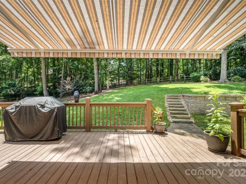 345 Beaten Path Road, Mooresville, NC 28117.  MLS# CAR4269577, YatesRealty ID 21006. Back Deck with Sun Setter retractable awnings