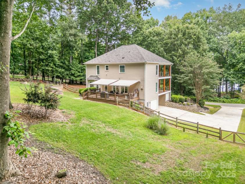 345 Beaten Path Road, Mooresville, NC 28117.  MLS# CAR4269577, YatesRealty ID 21006. Back yard view from other side