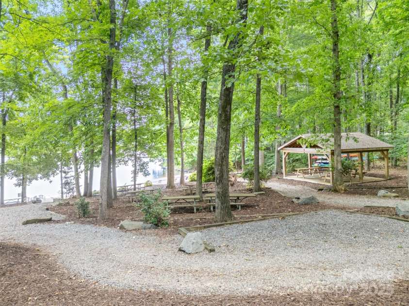345 Beaten Path Road, Mooresville, NC 28117.  MLS# CAR4269577, YatesRealty ID 21006. Community picnic area and gazebo located at the beach