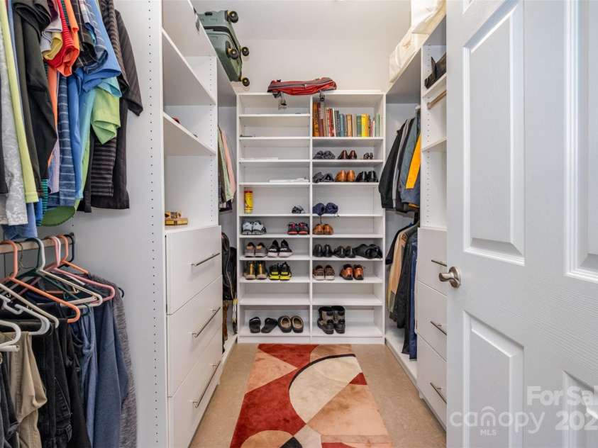 345 Beaten Path Road, Mooresville, NC 28117.  MLS# CAR4269577, YatesRealty ID 21006. One of two walk in closets in the primary suite