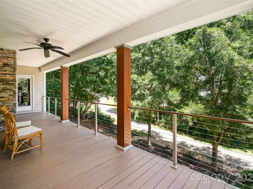 345 Beaten Path Road, Mooresville, NC 28117.  MLS# CAR4269577, YatesRealty ID 21006. Upper level wrap around porch