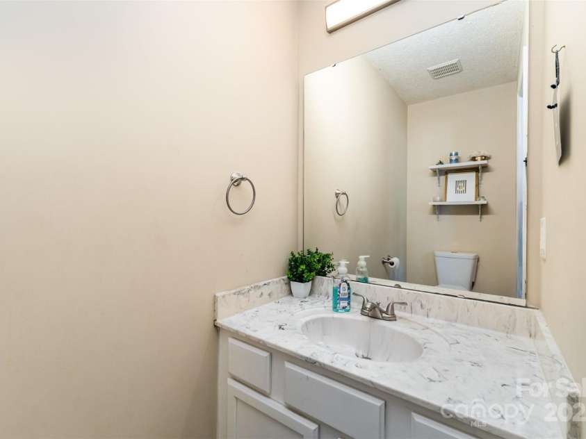 2040 Brantley Creek Drive, Kannapolis, NC 28083.  MLS# CAR4286622, YatesRealty ID 21011. First-floor powder room.