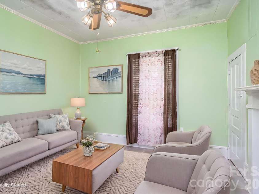 101 Huss Avenue, Cherryville, NC 28021.  MLS# CAR4378951, YatesRealty ID 21013. Virtually staged dining room as another living room/den