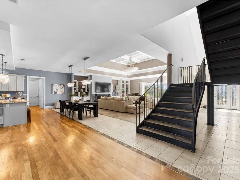 16455 Harbor View Road, Charlotte, NC 28278.  MLS# CAR4233006, YatesRealty ID 21013. Great room and stairs