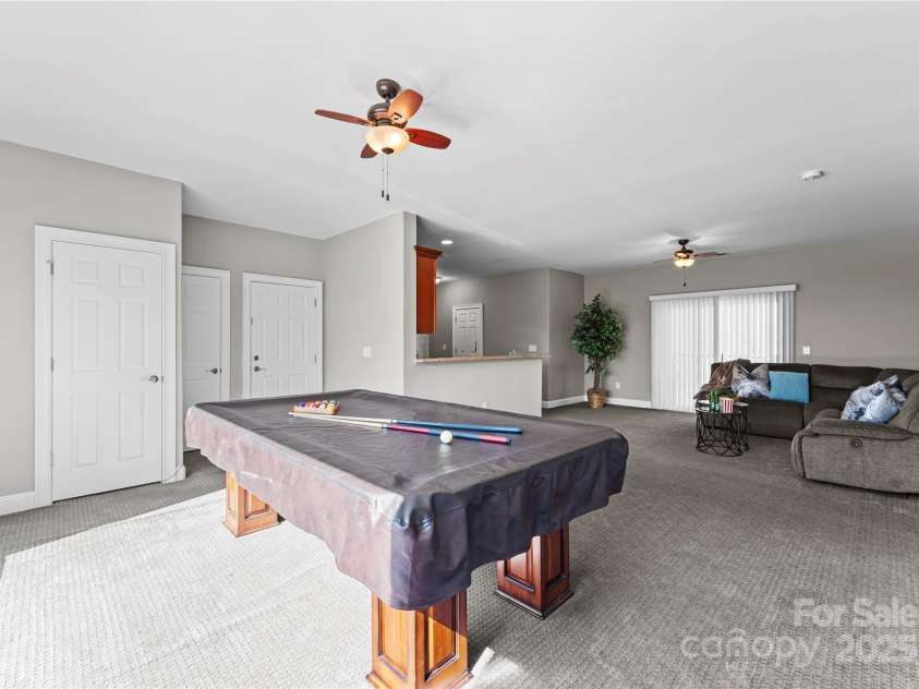 16455 Harbor View Road, Charlotte, NC 28278.  MLS# CAR4233006, YatesRealty ID 21013. Second living space living room