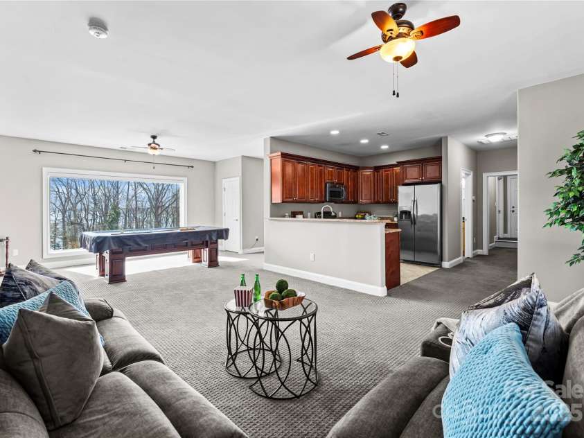 16455 Harbor View Road, Charlotte, NC 28278.  MLS# CAR4233006, YatesRealty ID 21013. Second living space seating area