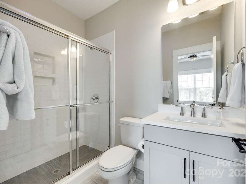 15312 Ravenall Drive, Huntersville, NC 28078.  MLS# CAR4247348, YatesRealty ID 21018. Ensuite bathroom