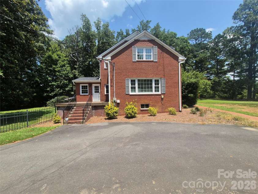 215 Biscoe Road, Troy, NC 27371.  MLS# CAR4346289, YatesRealty ID 2102. 