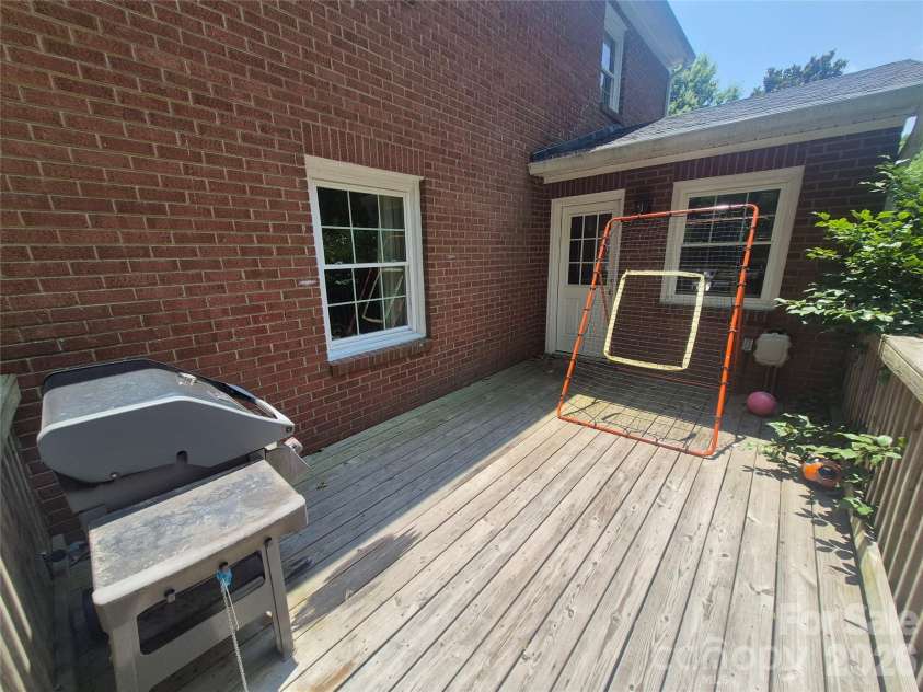 215 Biscoe Road, Troy, NC 27371.  MLS# CAR4346289, YatesRealty ID 2102. Back Deck