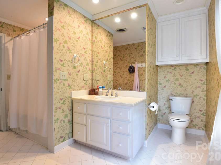 215 Biscoe Road, Troy, NC 27371.  MLS# CAR4346289, YatesRealty ID 2102. Bathroom in Upstairs Hallway