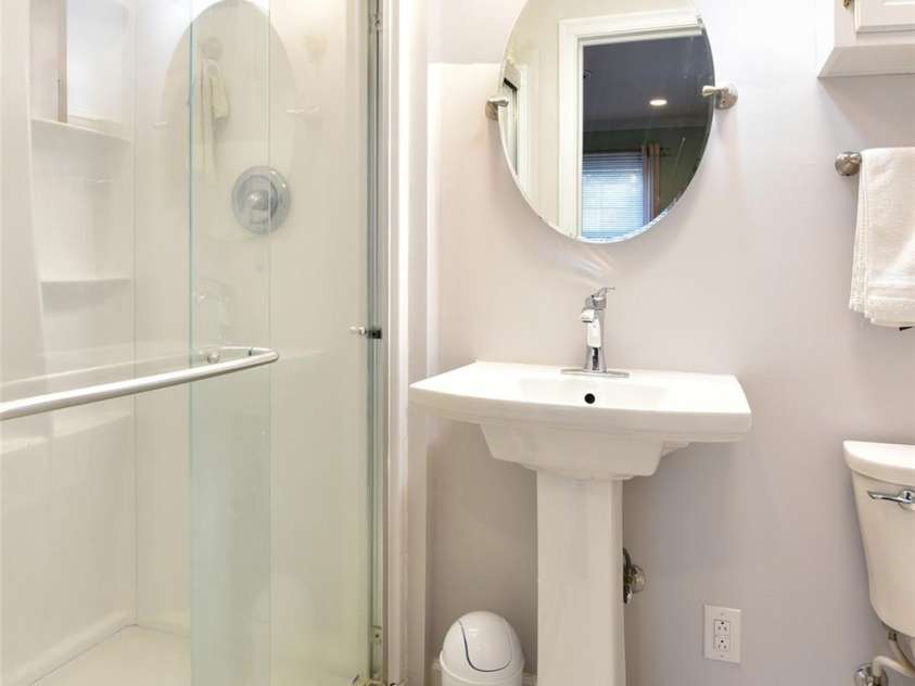 215 Biscoe Road, Troy, NC 27371.  MLS# CAR4346289, YatesRealty ID 2102. En Suite Bathroom