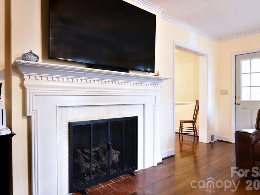 215 Biscoe Road, Troy, NC 27371.  MLS# CAR4346289, YatesRealty ID 2102. Living room