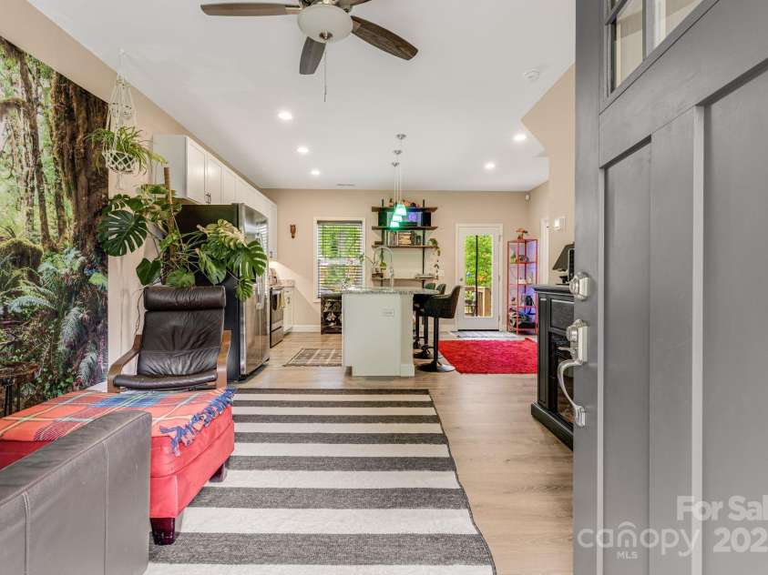 19 Shadowlawn Drive, Asheville, NC 28806.  MLS# CAR4258649, YatesRealty ID 21020. LVP flooring detail and tons of natural light