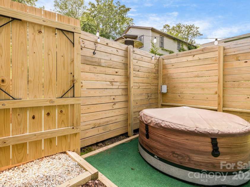 19 Shadowlawn Drive, Asheville, NC 28806.  MLS# CAR4258649, YatesRealty ID 21020. Private Patio for relaxing in the hot tub
