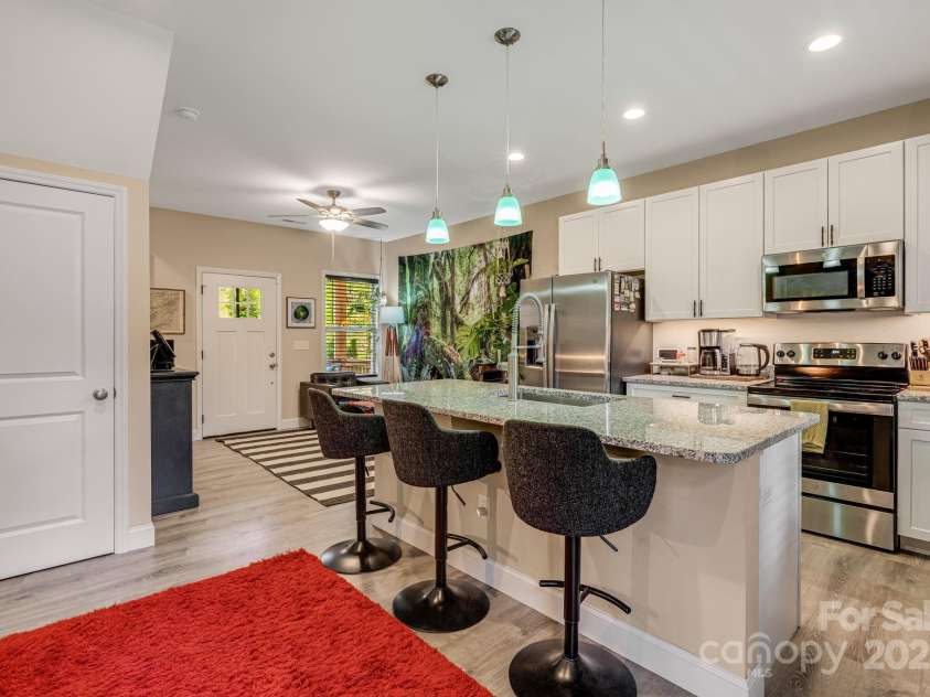 19 Shadowlawn Drive, Asheville, NC 28806.  MLS# CAR4258649, YatesRealty ID 21020. Seamless flow between living, dining, and kitchen areas