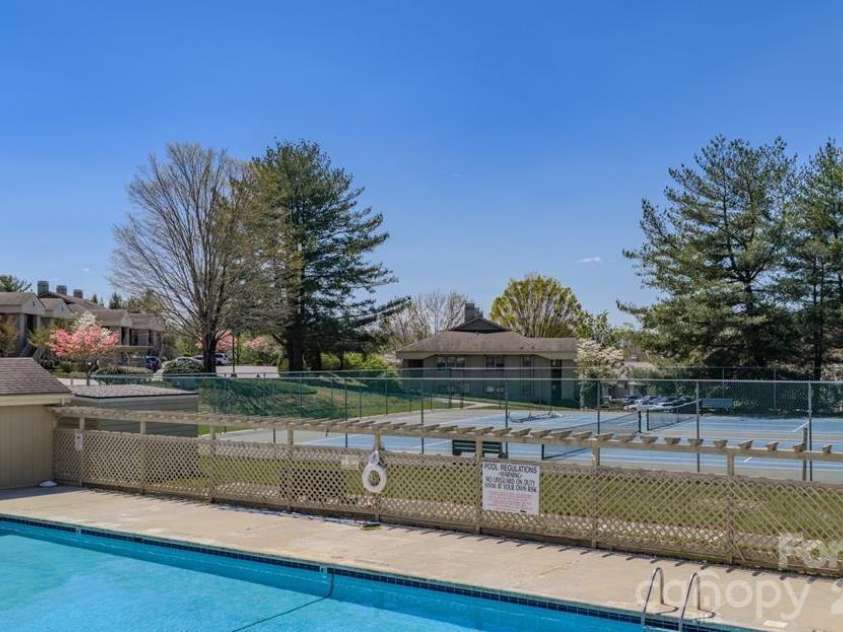 2401 Abbey Circle, Asheville, NC 28805.  MLS# CAR4379167, YatesRealty ID 21020. Enjoy the large pool.