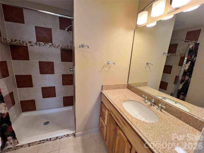 2401 Abbey Circle, Asheville, NC 28805.  MLS# CAR4379167, YatesRealty ID 21020. Updated primary bathroom.