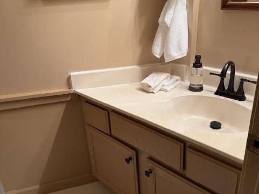 26 Cumberland Drive, Lake Toxaway, NC 28747.  MLS# CAR4262953, YatesRealty ID 21021. Downstairs full bath